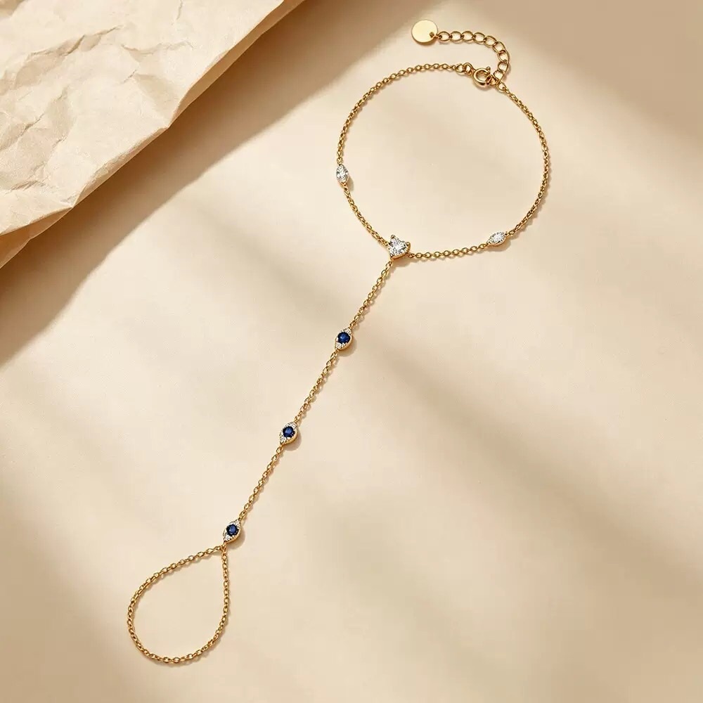 Gold Hand Chain Bracelet with Blue and Clear Stones
